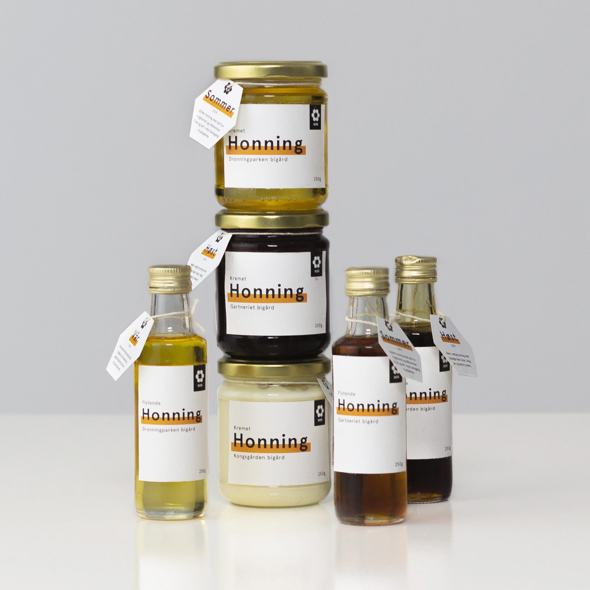 Stack of honey jars and bottles